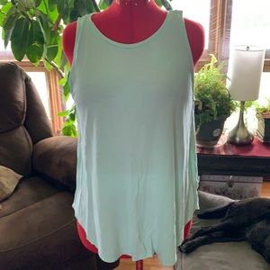 Sleeveless light green tee shirt